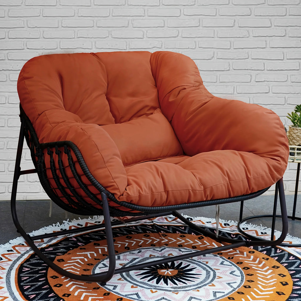 The Papasan rocking chair is suitable for outdoor use. This all-weather wicker Papasan patio chaircomeswithcushions and pillows.