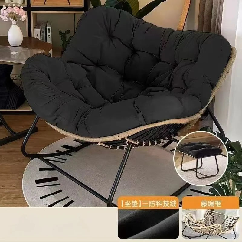 The Papasan rocking chair is suitable for outdoor use. This all-weather wicker Papasan patio chaircomeswithcushions and pillows.