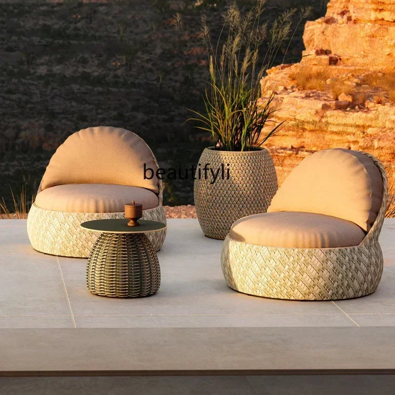 Outdoor rattan leisure creative open-air courtyard hotel art sofa chair coffee table combination