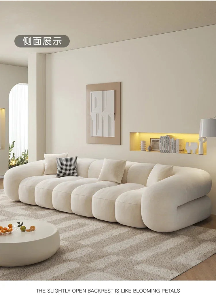 Living Room Modern Simple Straight Cotton Candy Skin Feeling Velvet Sofa Puff Retro11
