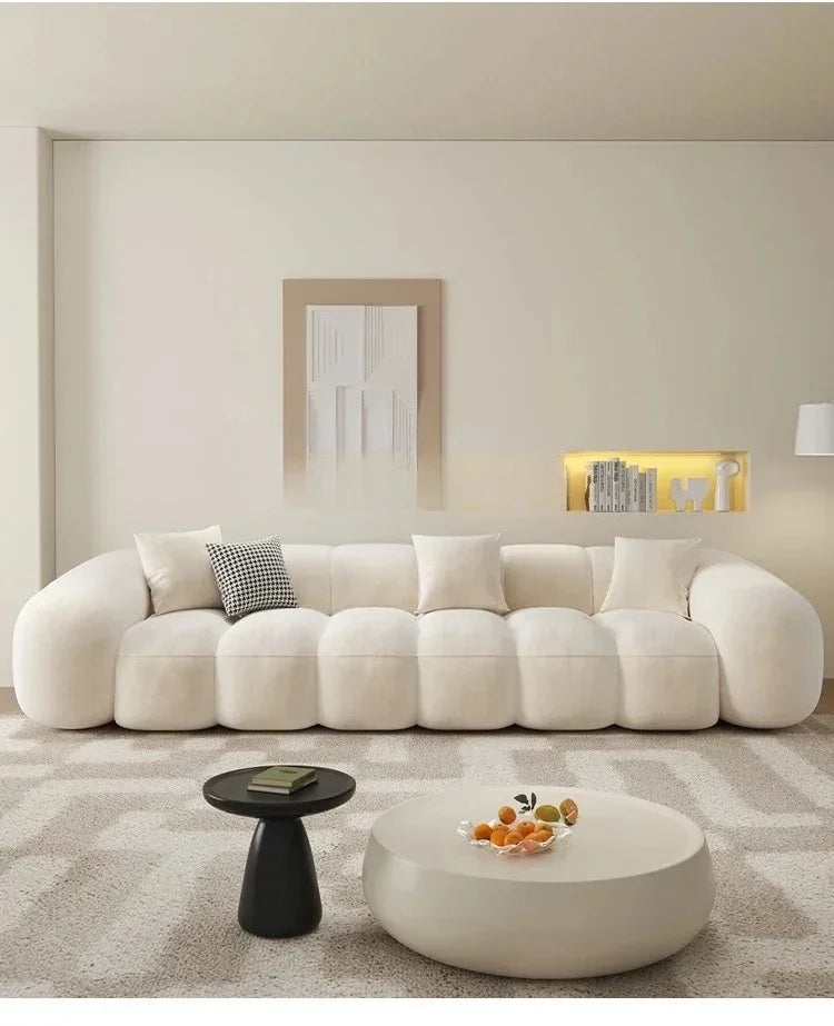 Living Room Modern Simple Straight Cotton Candy Skin Feeling Velvet Sofa Puff Retro11