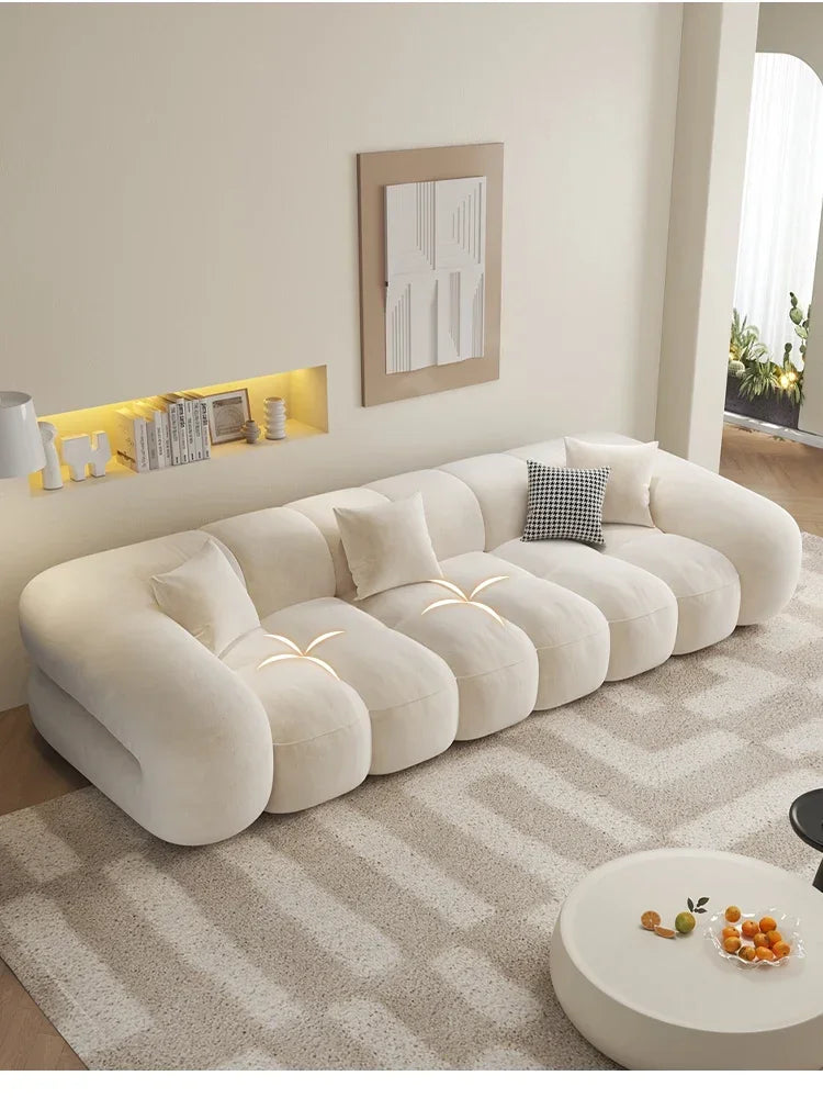Living Room Modern Simple Straight Cotton Candy Skin Feeling Velvet Sofa Puff Retro11